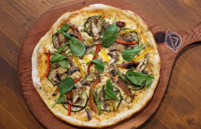 Con The Top Pizza Delivery podrás degustar más de 60 pizzas a $ 3.990